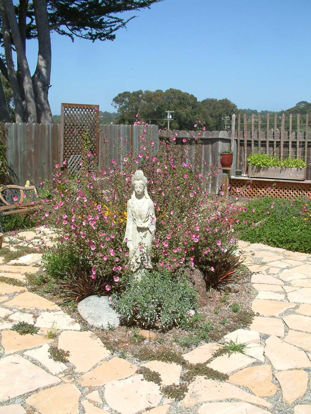 Kuan Yin Overlooks Garden